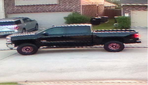 Photo of black Chevrolet Silverado in neighborhood